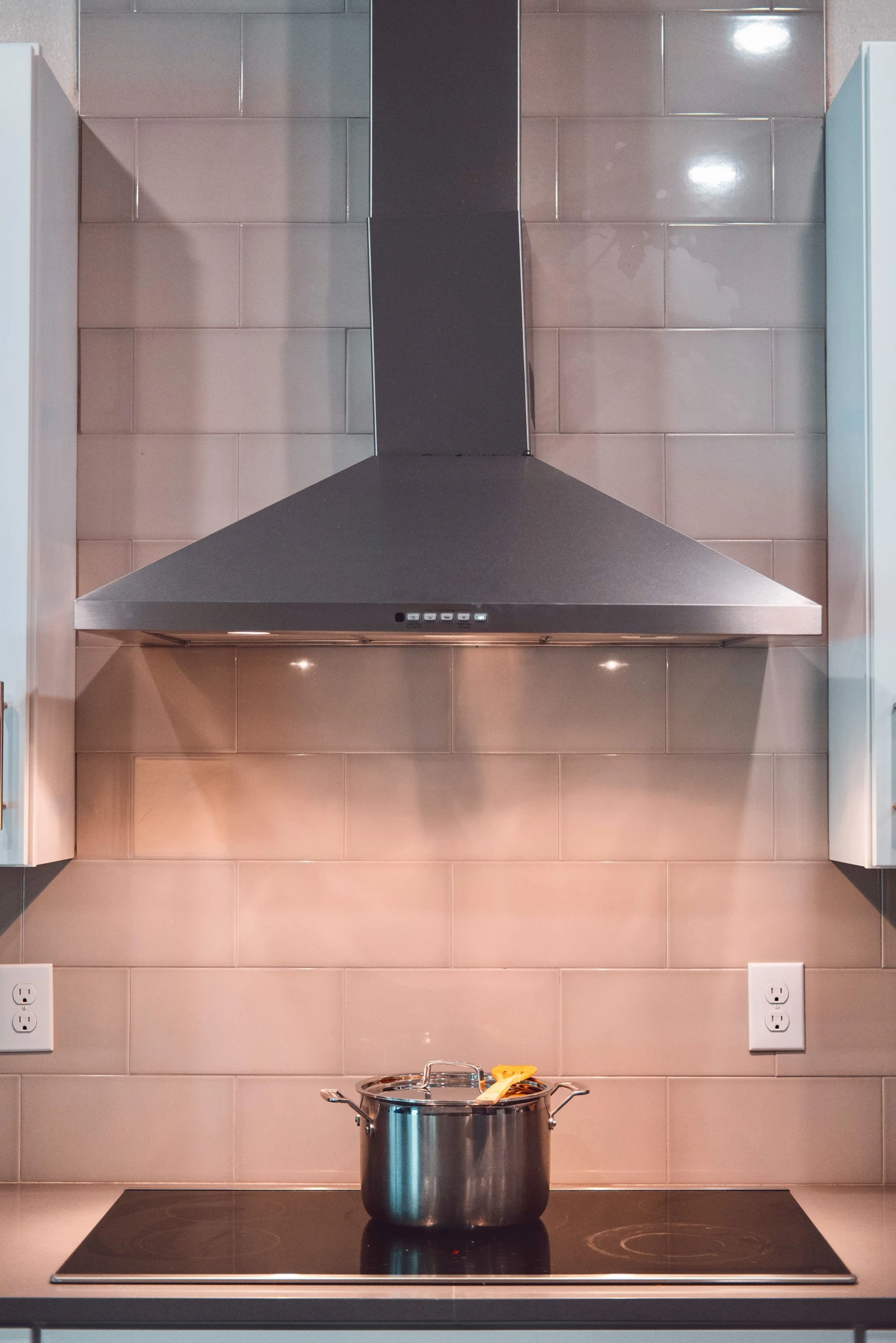 Commercial kitchen with a stainless steel extraction hood